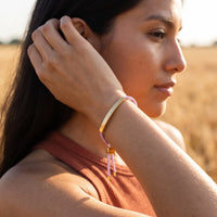 Thumbnail for Purple string bracelet — worn, everyday gesture, gold | SKU: lemauve-g