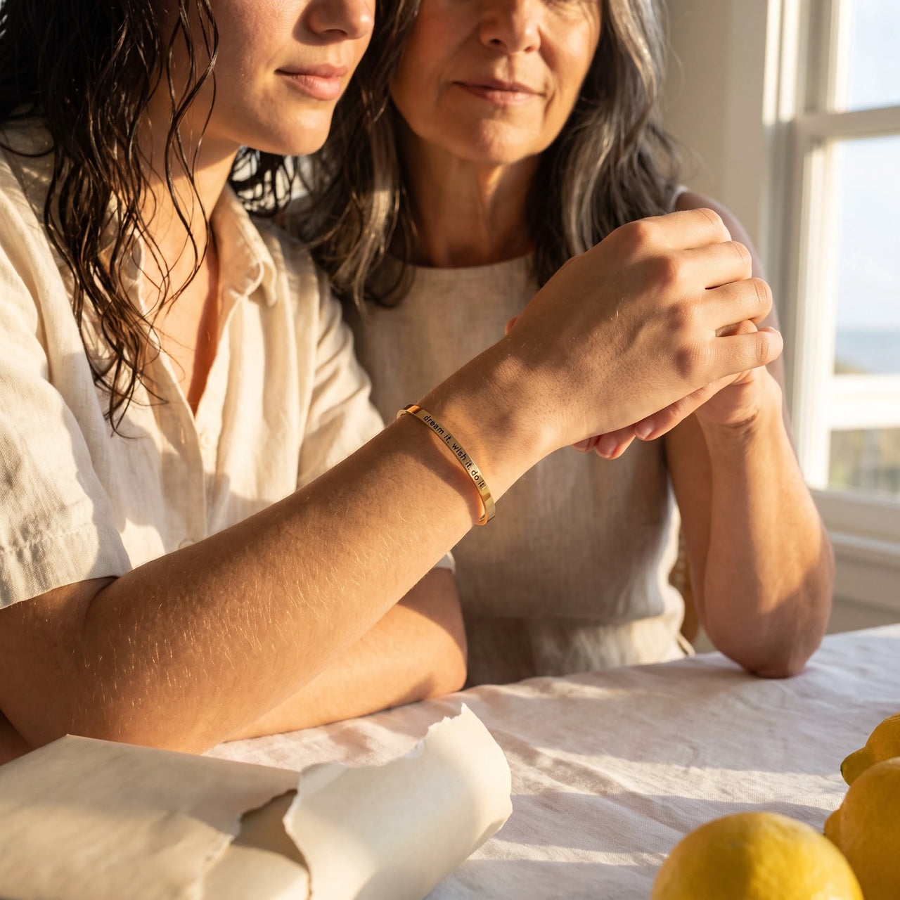 Gold engraved cuff bracelet offered as a gift between mother and daughter | SKU: 4214557-gold-color