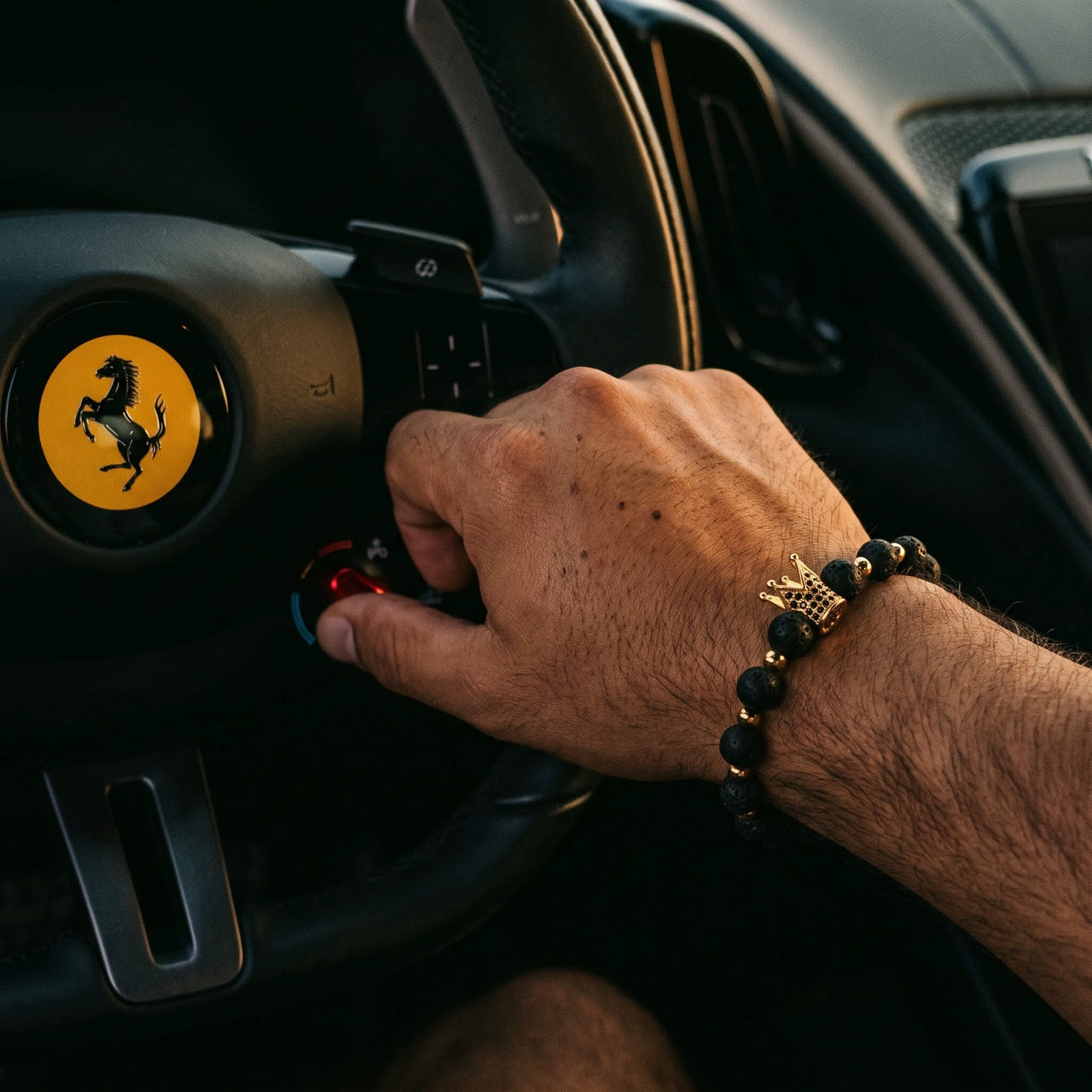 Gold Crown with Lava Stones – on a Ferrari steering wheel | Brother & Sisters | SKU: 22068514-gold-XS-14-15, 22068514-gold-S-16-17, 22068514-gold-M-18-19, 22068514-gold-L-20-21, 22068514-gold-XL-22-23