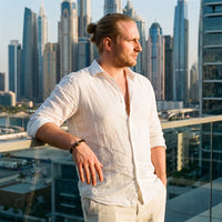 Thumbnail for Gold Crown with Lava Stones – man on a Dubai rooftop | Brother & Sisters | SKU: 22068514-gold-XS-14-15, 22068514-gold-S-16-17, 22068514-gold-M-18-19, 22068514-gold-L-20-21, 22068514-gold-XL-22-23