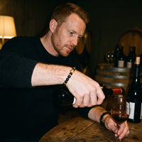 Thumbnail for Gold Lion & Black Stones Bracelet – worn while pouring red wine | Brother & Sisters | SKU: 20712286-gold-XS-14-15, 20712286-gold-S-16-17, 20712286-gold-M-18-19, 20712286-gold-L-20-21, 20712286-gold-XL-22-23