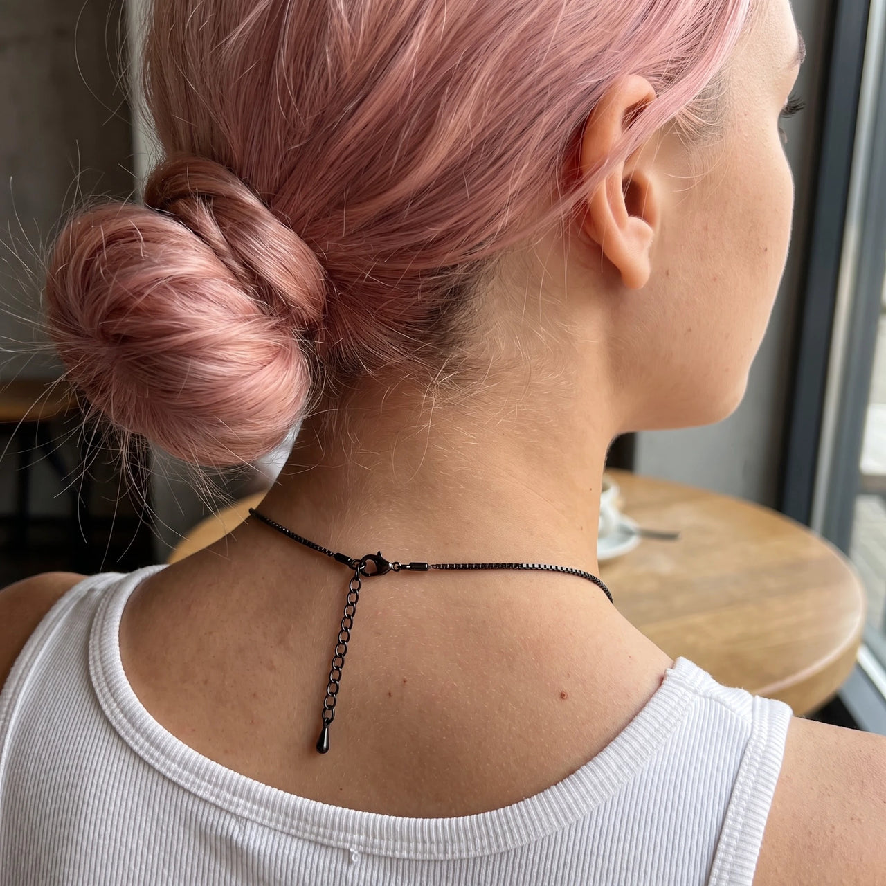 Back of the neck showing the lobster clasp and extension chain of the black heart photo necklace | SKU: TPH-CHTN-BLACK-SMALL