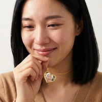 Thumbnail for Woman moved to tears looking at her grandmother's photo in the secret heart necklace | SKU: TPH-HRTN-GOLD