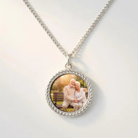 Thumbnail for Secret Round Photo Necklace in silver, black round pendant turning into a hidden photo when warmed | SKU: TPH-RNDN-SILVER